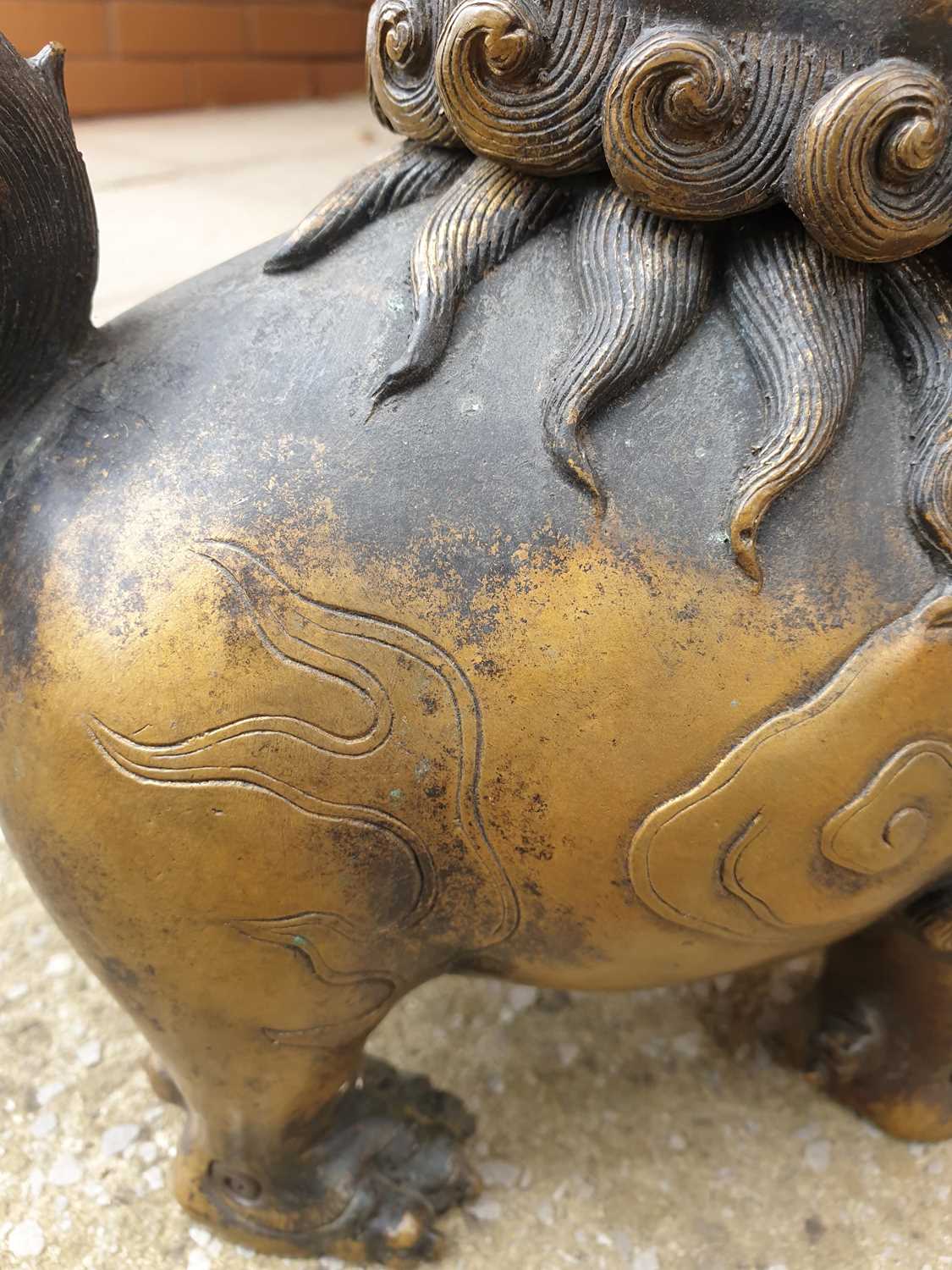 A large Chinese bronze Pixiu censor, with open mouth, scrolling mane and eyebrows, the ears pricked, - Image 25 of 27