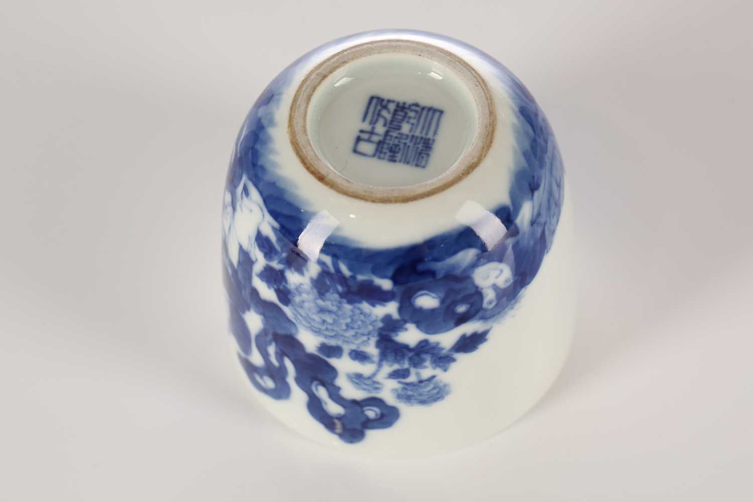 A Chinese blue & white chicken cup, Qing, painted with a boy and chicken between rocks and - Image 2 of 5