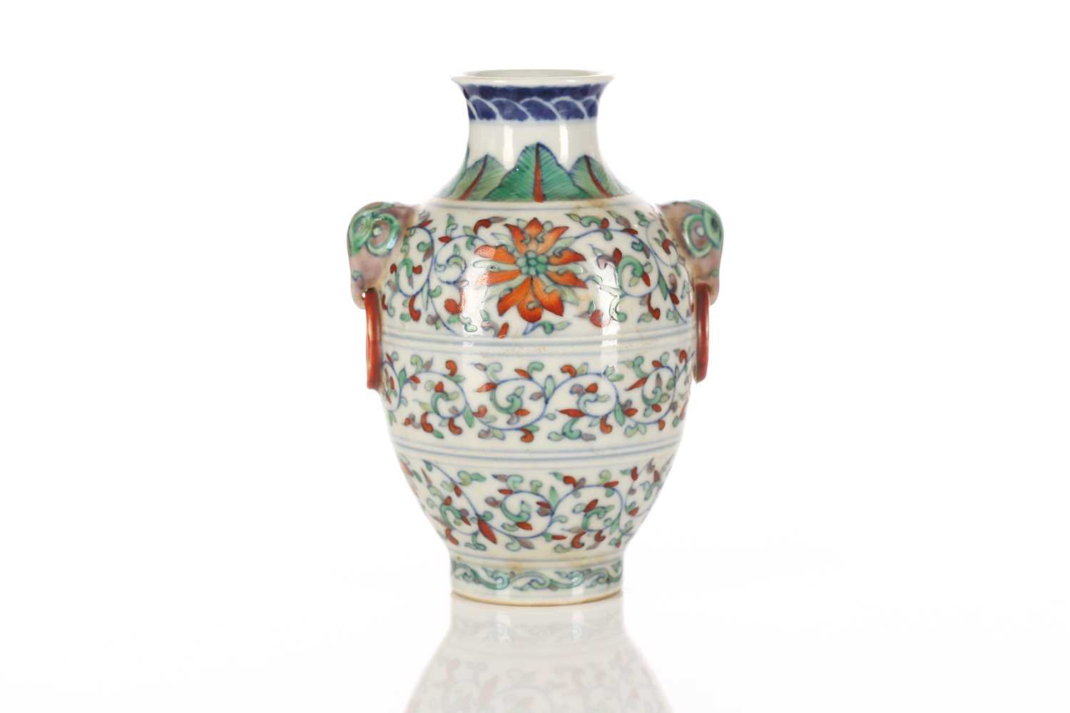 A Chinese porcelain Doucai vase, the shoulder painted with leaves above light aubergine elephant - Image 2 of 5