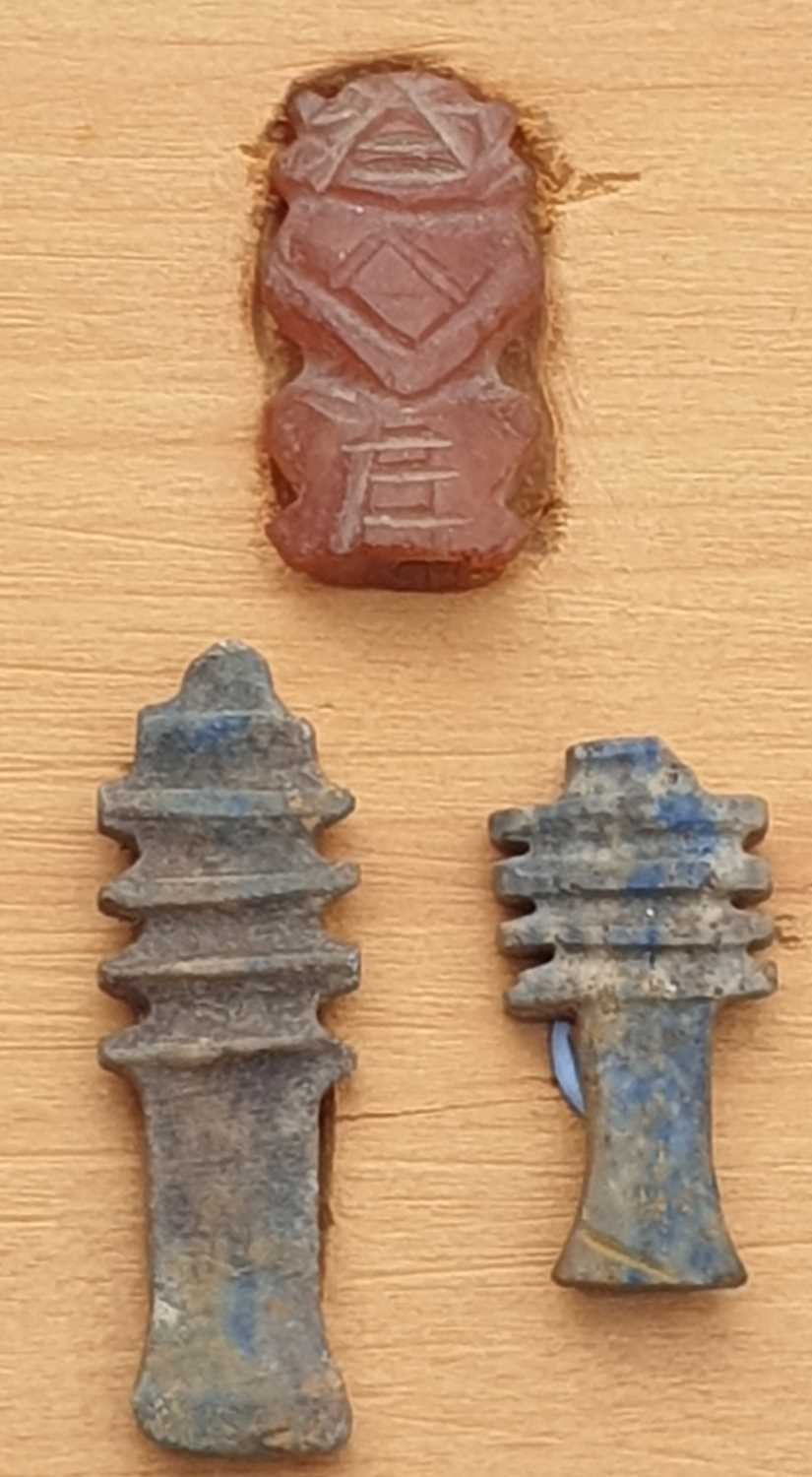 A Collection of Ancient Egyptian artefacts including a bronze Djed pillar amulet, agate Tawaret - Image 9 of 30