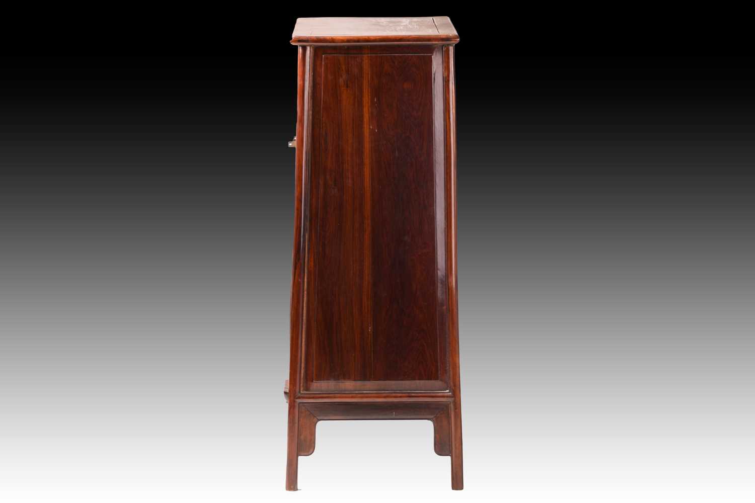 A Chinese Huanghuali tapering two-door cabinet with radiused corners, Qing Dynasty. Each door with - Image 7 of 50