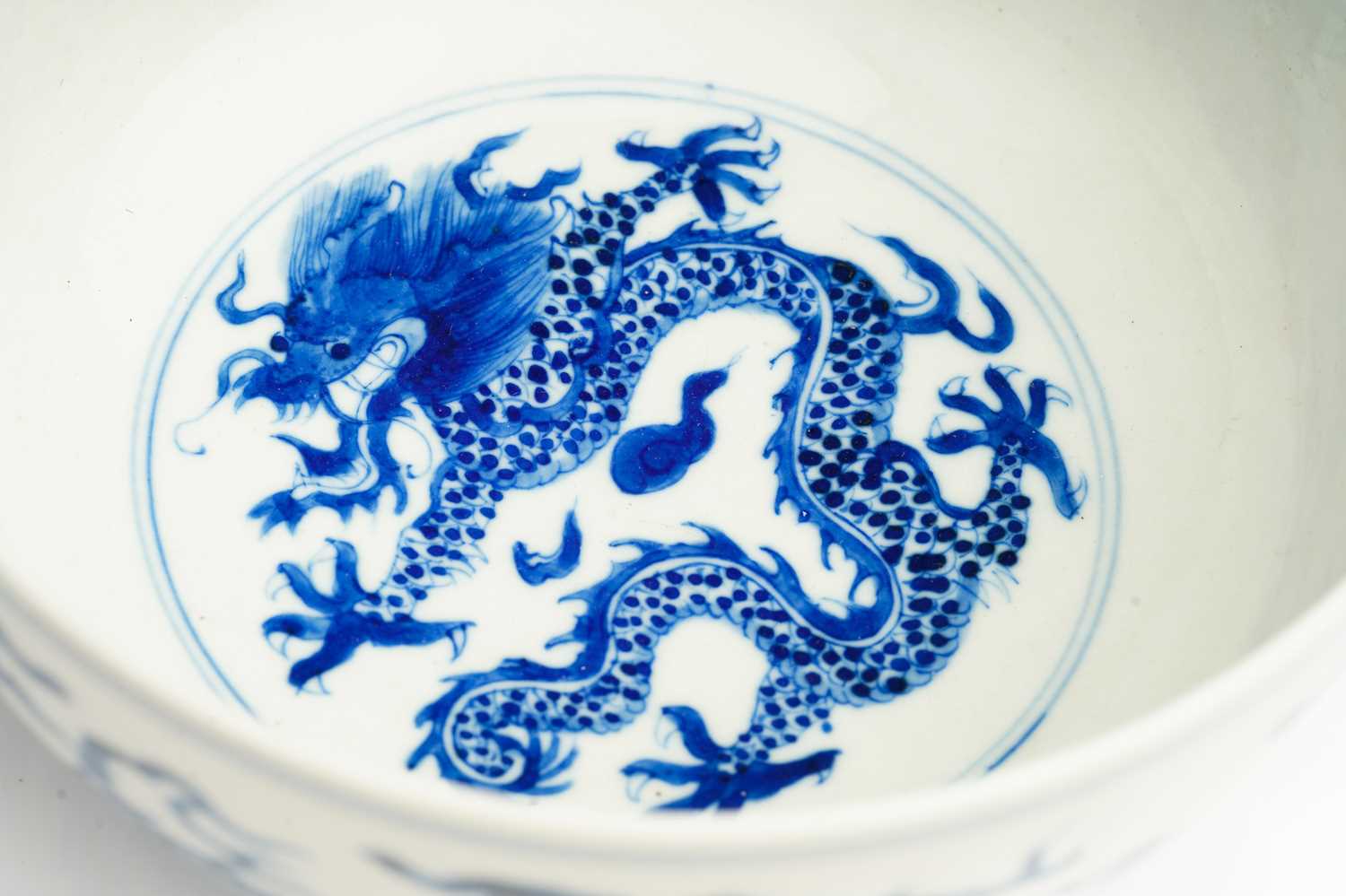 A Chinese porcelain blue & white dragon bowl, the interior with a single writhing dragon, the - Image 4 of 7