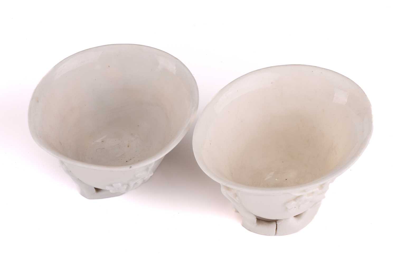 Two Chinese Dehua blanc de chine libation cups, Qing dynasty, 18th century, each with applied - Image 6 of 35