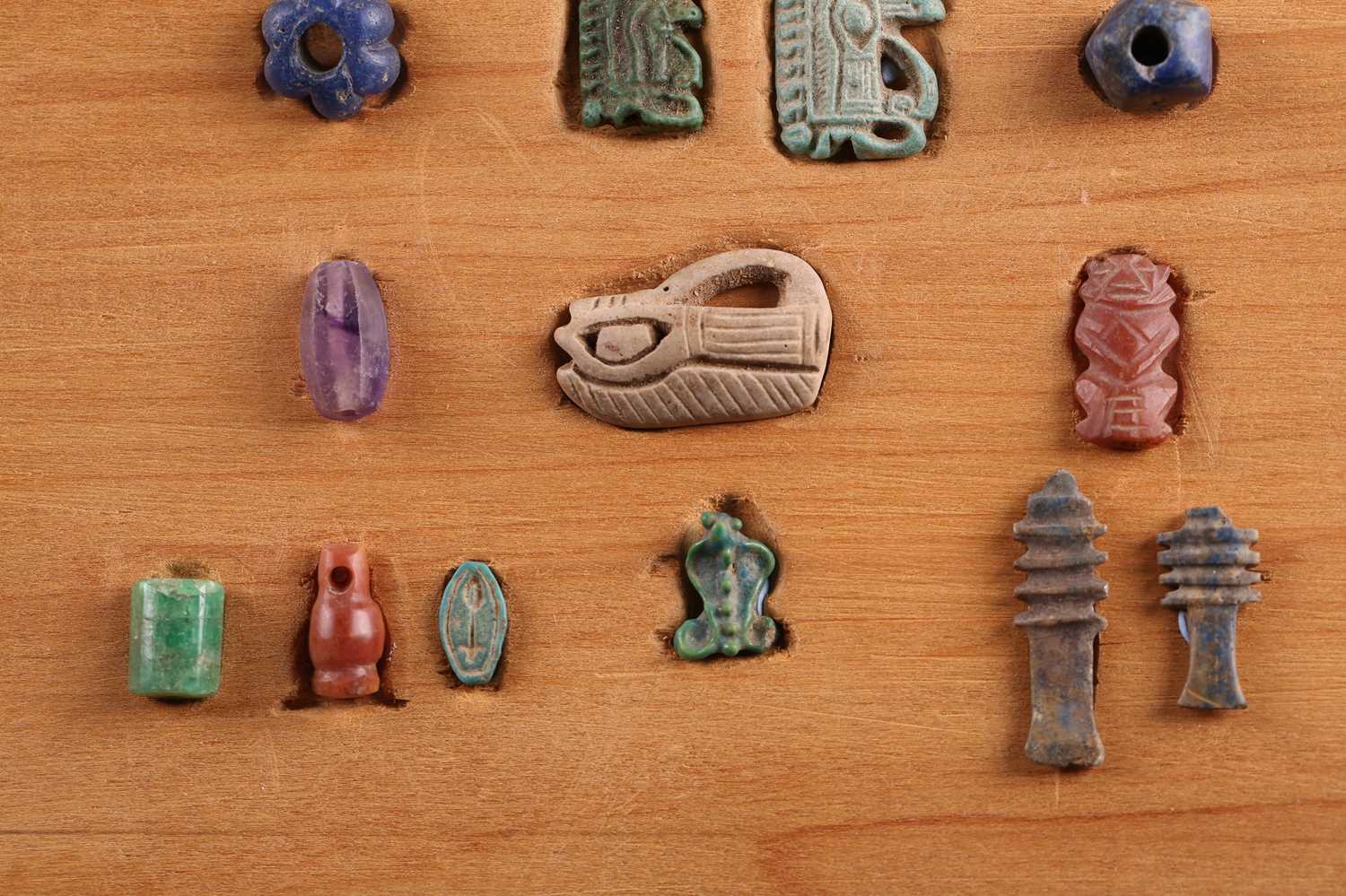 A Collection of Ancient Egyptian artefacts including a bronze Djed pillar amulet, agate Tawaret - Image 7 of 30