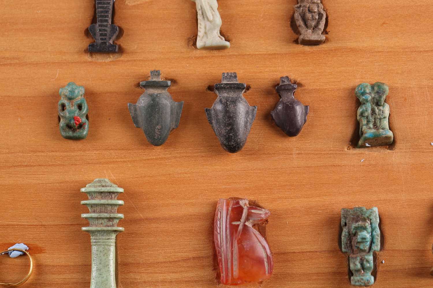 A Collection of Ancient Egyptian artefacts including a bronze Djed pillar amulet, agate Tawaret - Image 2 of 30