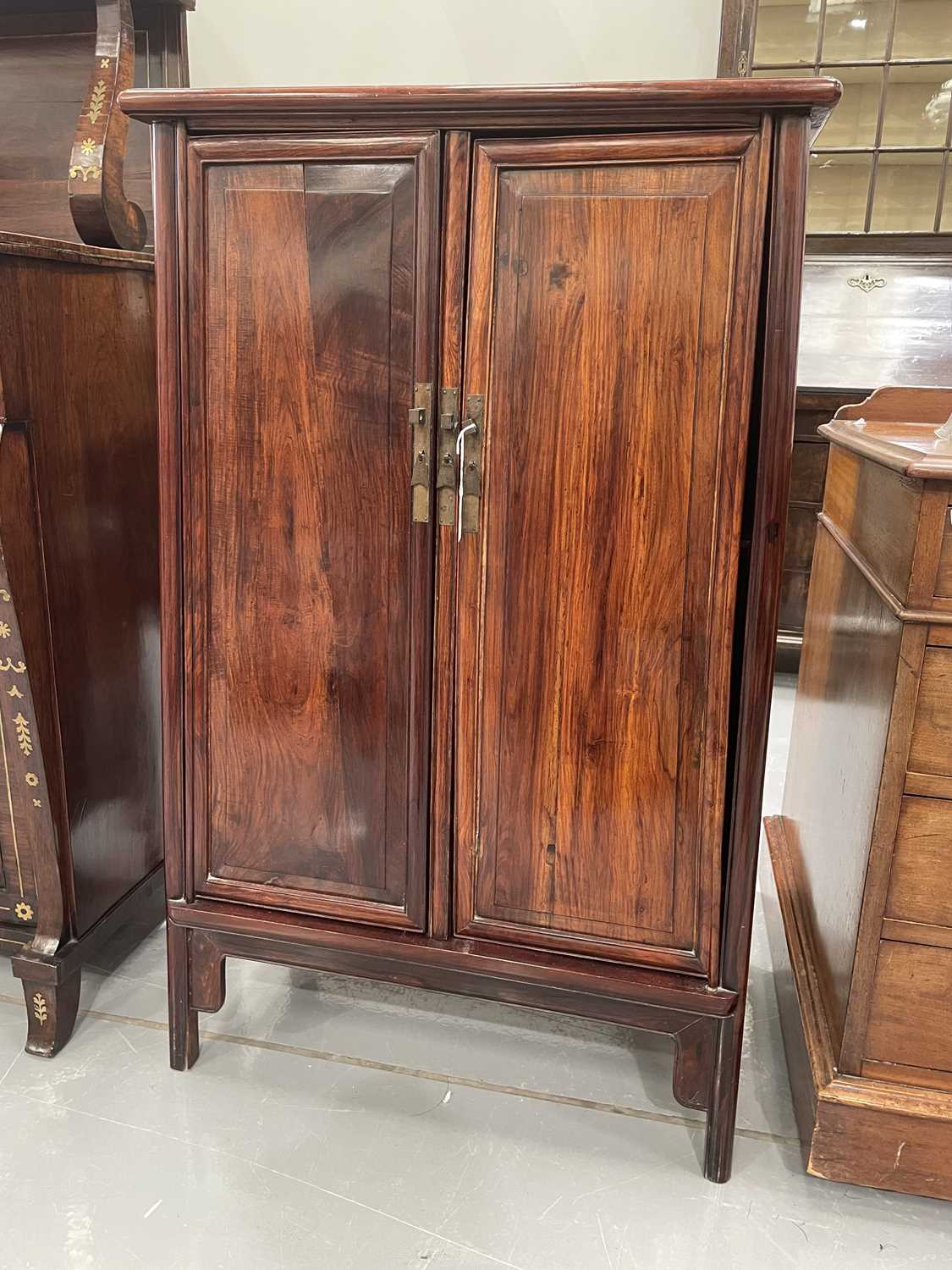 A Chinese Huanghuali tapering two-door cabinet with radiused corners, Qing Dynasty. Each door with - Image 11 of 50