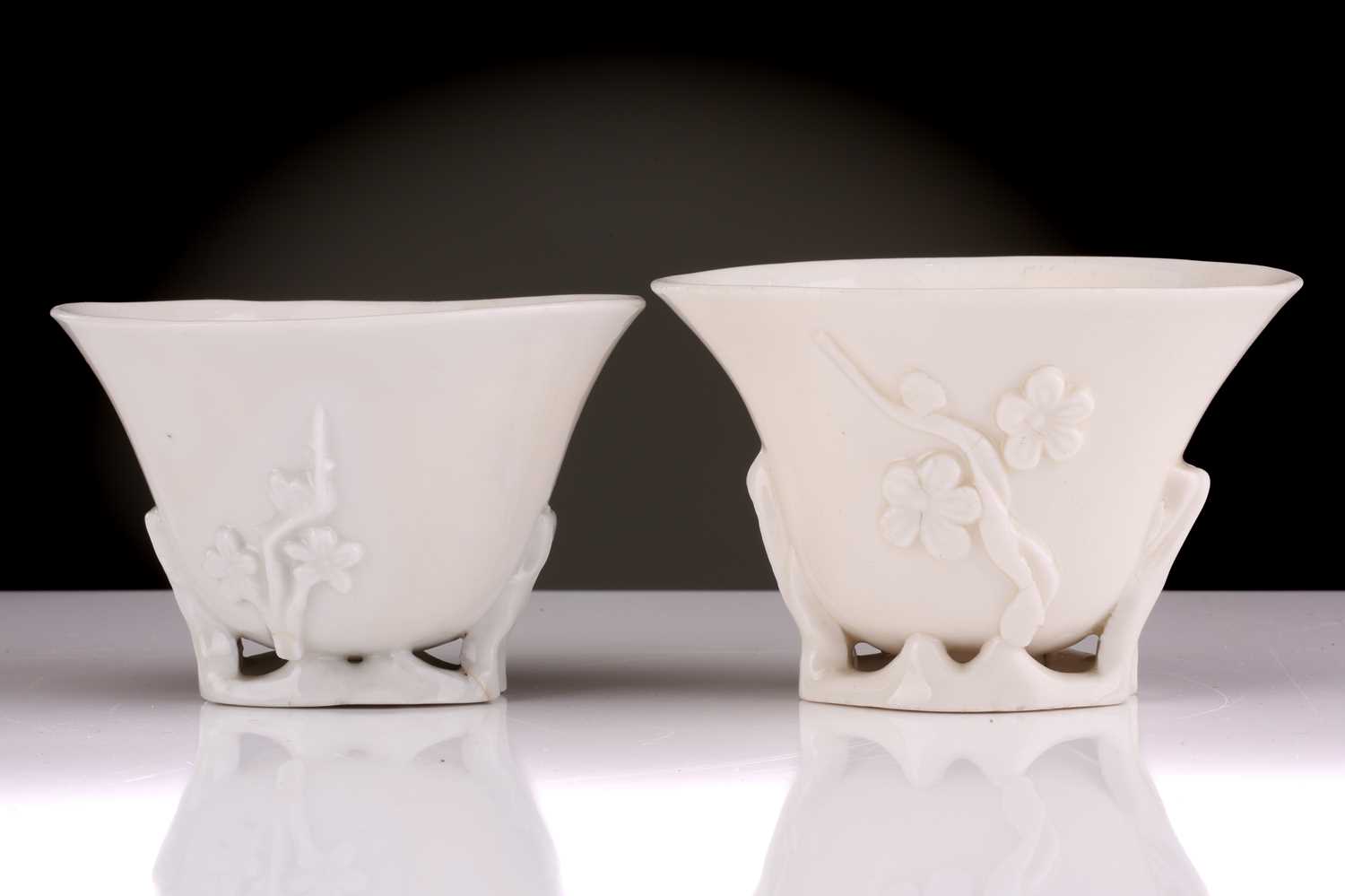 Two Chinese Dehua blanc de chine libation cups, Qing dynasty, 18th century, each with applied - Image 4 of 35