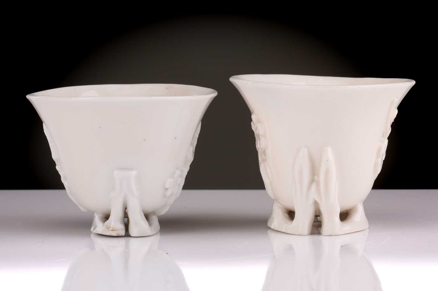 Two Chinese Dehua blanc de chine libation cups, Qing dynasty, 18th century, each with applied - Image 5 of 35