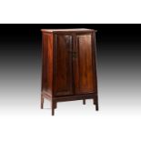 A Chinese Huanghuali tapering two-door cabinet with radiused corners, Qing Dynasty. Each door with