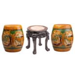 A pair of Chinese sancai glazed barrel form conservatory seats, with relief moulded panels of stags,