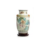 A large Chinese famille rose porcelain vase, painted with the eight immortals and attendants in a