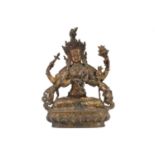 A Chinese Sino Tibetan style bronze Tara, seated in dhyanasana, the six arms with attributes, traces