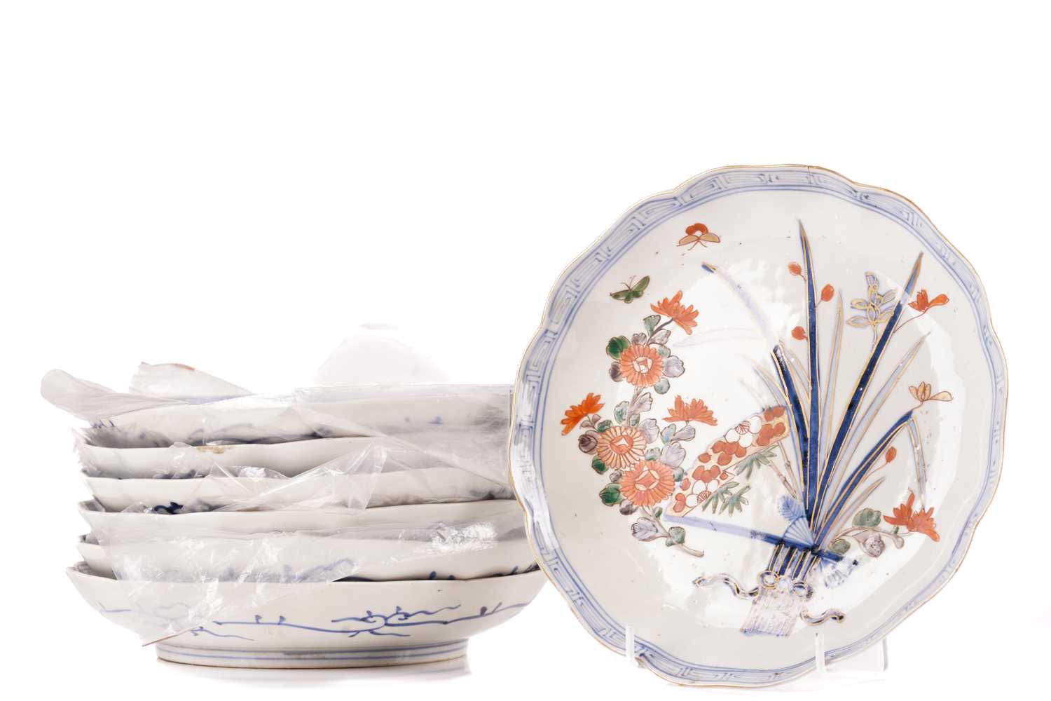 A set of seven Japanese Arita plates, late 19th century, painted with flowers and leaves with - Image 2 of 17