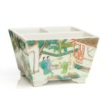 A Chinese porcelain scholars desk accessory, painted in a famille verte palette, each side with