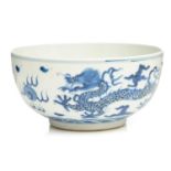 A Chinese porcelain blue & white dragon bowl, the interior with a single writhing dragon, the
