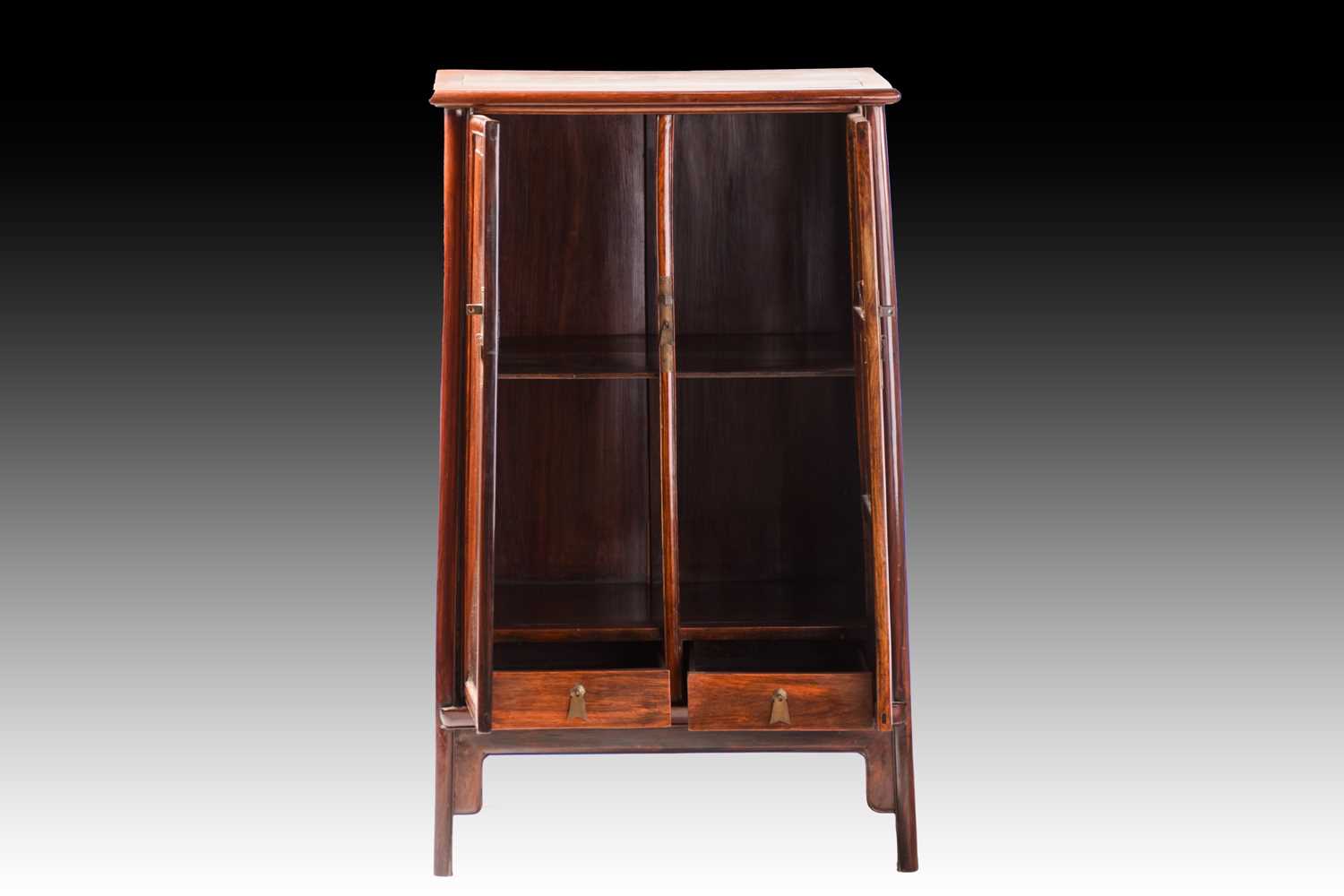 A Chinese Huanghuali tapering two-door cabinet with radiused corners, Qing Dynasty. Each door with - Image 9 of 50