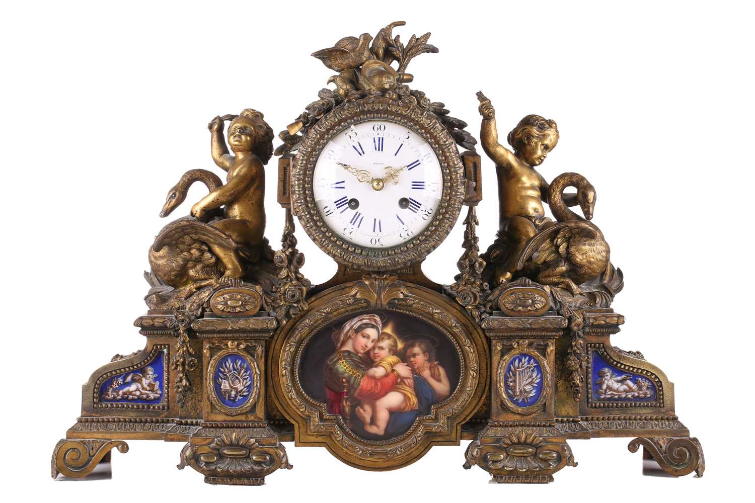 Grohe of Wigmore St, London; a late 19th-century ormolu 8-day mantle clock with trophy surmount