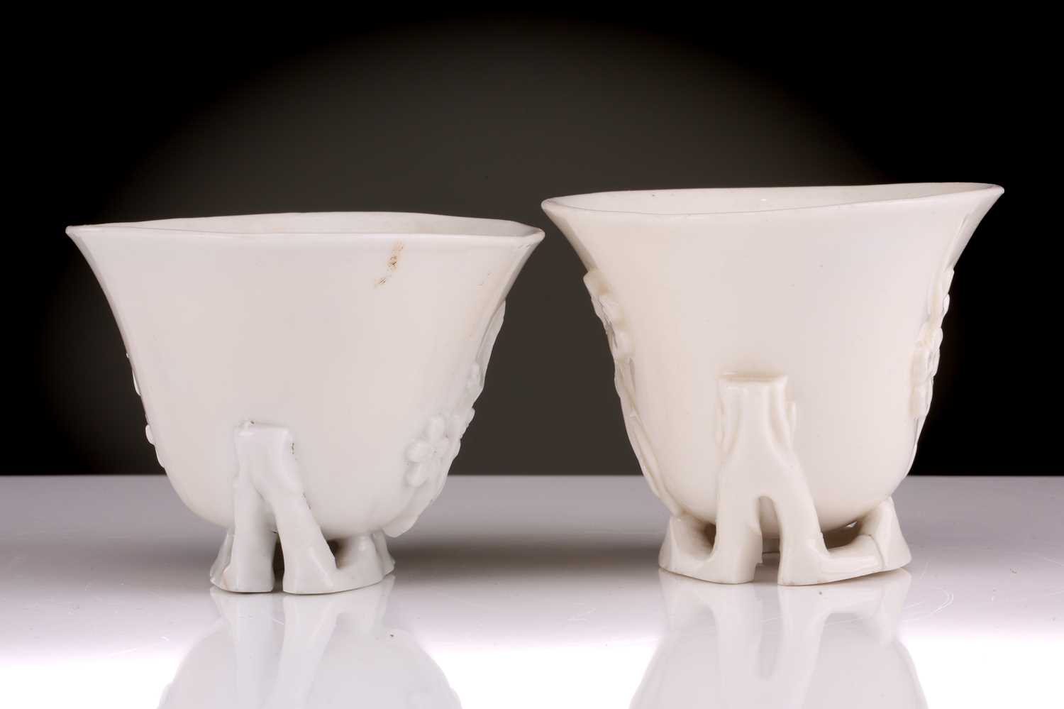 Two Chinese Dehua blanc de chine libation cups, Qing dynasty, 18th century, each with applied - Image 3 of 35