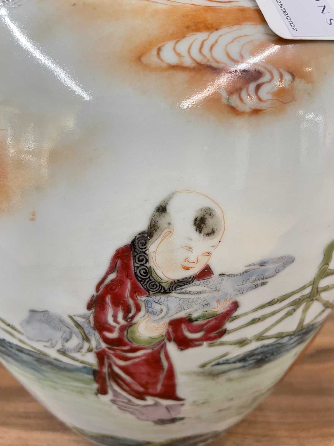 A Chinese porcelain vase, late Qing dynasty, painted with Shoulao and a boy attendant within a - Image 13 of 33