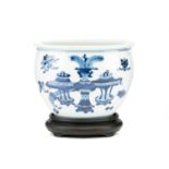 A Chinese blue & white jardiniere, painted with a panel of birds and blossoming tree peony and verso