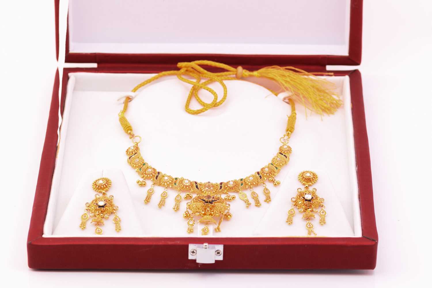 An enamel and paste and yellow metal bridal set; the necklace composed of scrolling and oval pierced - Image 3 of 12