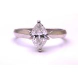 A marquise diamond solitaire ring, comprises a marquise-shaped diamond of 9.1 x 5.6 mm in a high-
