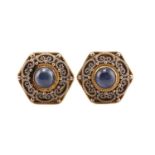 A pair of sapphire hexagonal earrings, each features a round sapphire cabochon centrally set in a