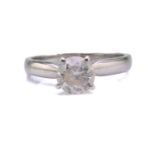 A diamond solitaire ring in platinum, set with a brilliant-cut diamond which approximately
