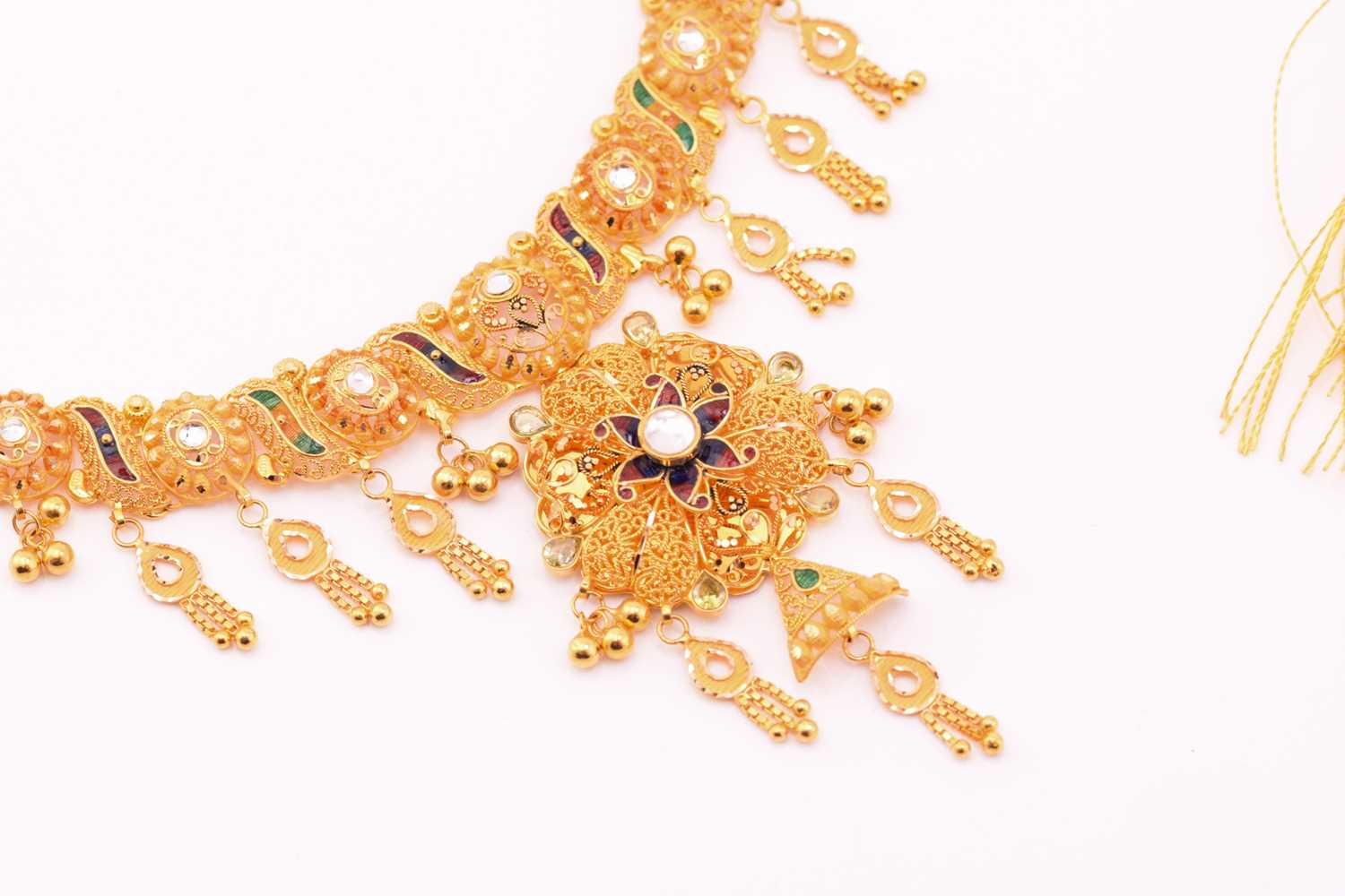 An enamel and paste and yellow metal bridal set; the necklace composed of scrolling and oval pierced - Image 5 of 12