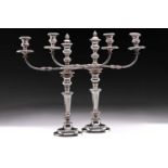 A pair of large silver plated two branch candelabra, the two scroll branches with detachable