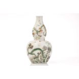 A Chinese porcelain famille verte dragon vase, of double gourd form, painted with two dragons