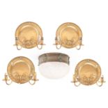 Four early 20th century brass twin branch wall lights, with circular back plates and scroll arms, 31