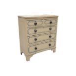 A late Victorian-painted pine chest of drawers with faux inlaid decoration fitted two short over