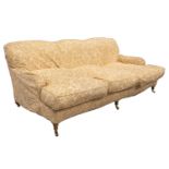 A 20th century Howard style "Bridgewater" type three seater oversized settee with sienna cotton