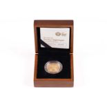 A 2010 £2 Florence Nightingale gold boxed proof coin, number 2, issued to Mary Spinks CBE on her
