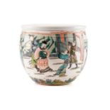 A Chinese porcelain famille verte jardiniere, painted with court figures in a garden setting,