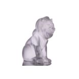 A Lalique 'Bamara' frosted glass sculpture of a lion seat on his haunches. 20 cm high x 17 cm long x