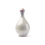 A Chinese porcelain suantouping vase, the lavender glazed body with splashes of red around the