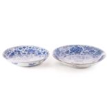Two Chinese blue & white porcelain chargers, Qing, 18th century and later, each painted with