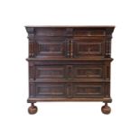 A late 17th-century walnut and oak two-section four-drawer chest of drawers. with split bobbin