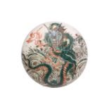 A Chinese porcelain famille verte bowl and cover, painted with a writhing dragon amongst spuming