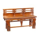 A Chinese elm temple bench, probably late 19th century, with carved double rail back over a thick