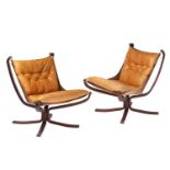 A pair of Sigurd Ressell Falcon chairs, for Mobler, with suspended buttoned tan hide seats and backs