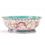 A Chinese famille rose porcelain bowl, Qing, 19th century, the interior with turquoise ground, the