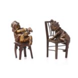 After Juan Clara, a bronze figure of a girl seated on a stool putting on a shoe, signed and numbered