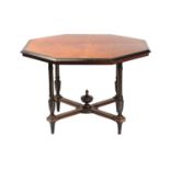 A late Victorian ebonized and amboyna veneered octagonal centre table in the manner of Maple & Co,