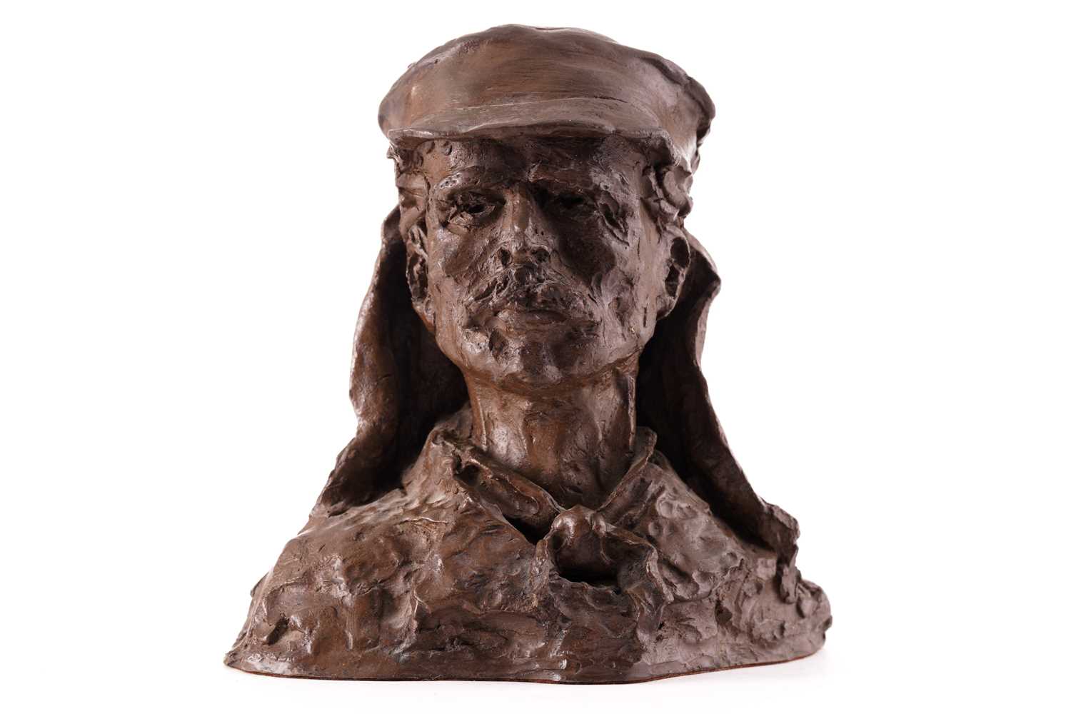 A cold cast bronzed resin bust of Dr. David Livingstone wearing a sun hat, monogrammed OW numbered