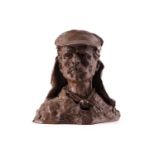 A cold cast bronzed resin bust of Dr. David Livingstone wearing a sun hat, monogrammed OW numbered