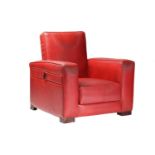 An Art Deco style red hide upholstered reclining club armchair with retracting drinks table. 82 cm