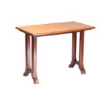 A late 19th-century oak reformed gothic side table with a plain rectangular top supported by two